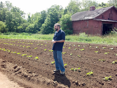 presenter in a recently planted row