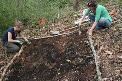 two women preparing a planting bed