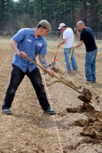 the planting crew preparing the soil